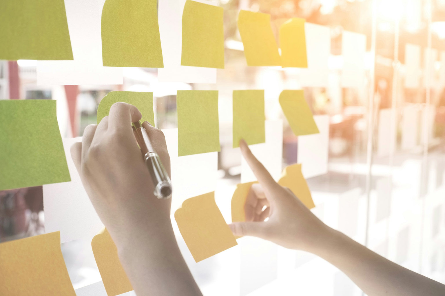 Re-imagining client journey with post it notes