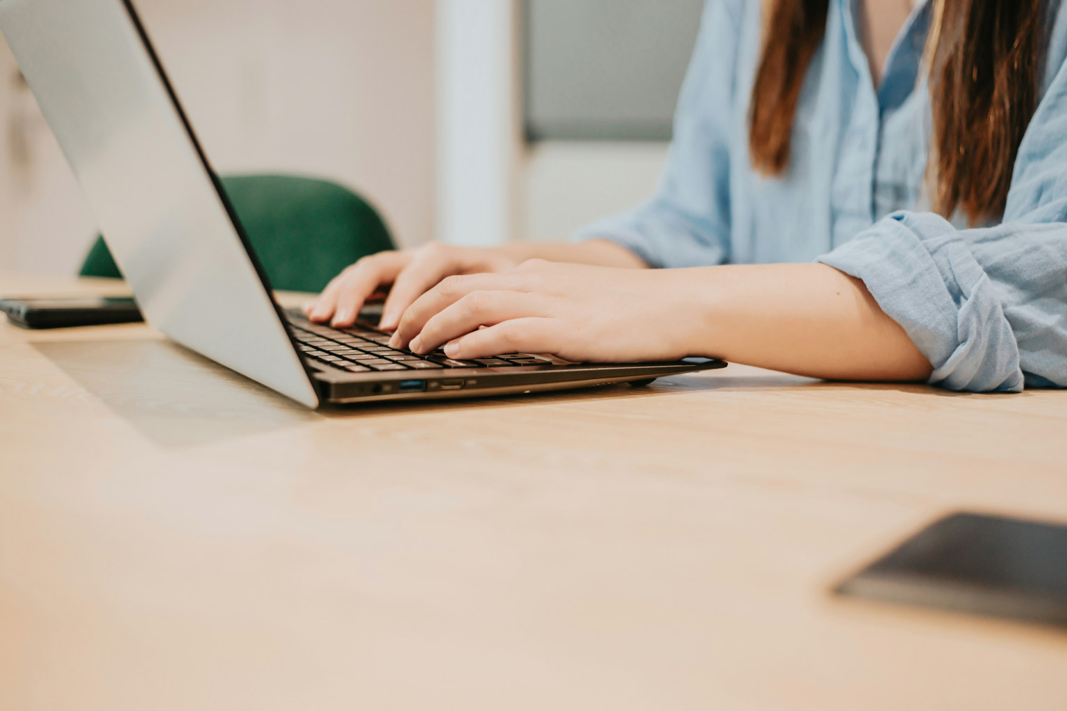 Typing on Laptop